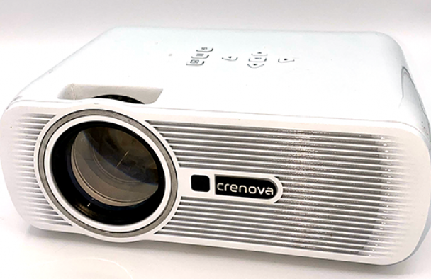 A white projector on display with a grey background.